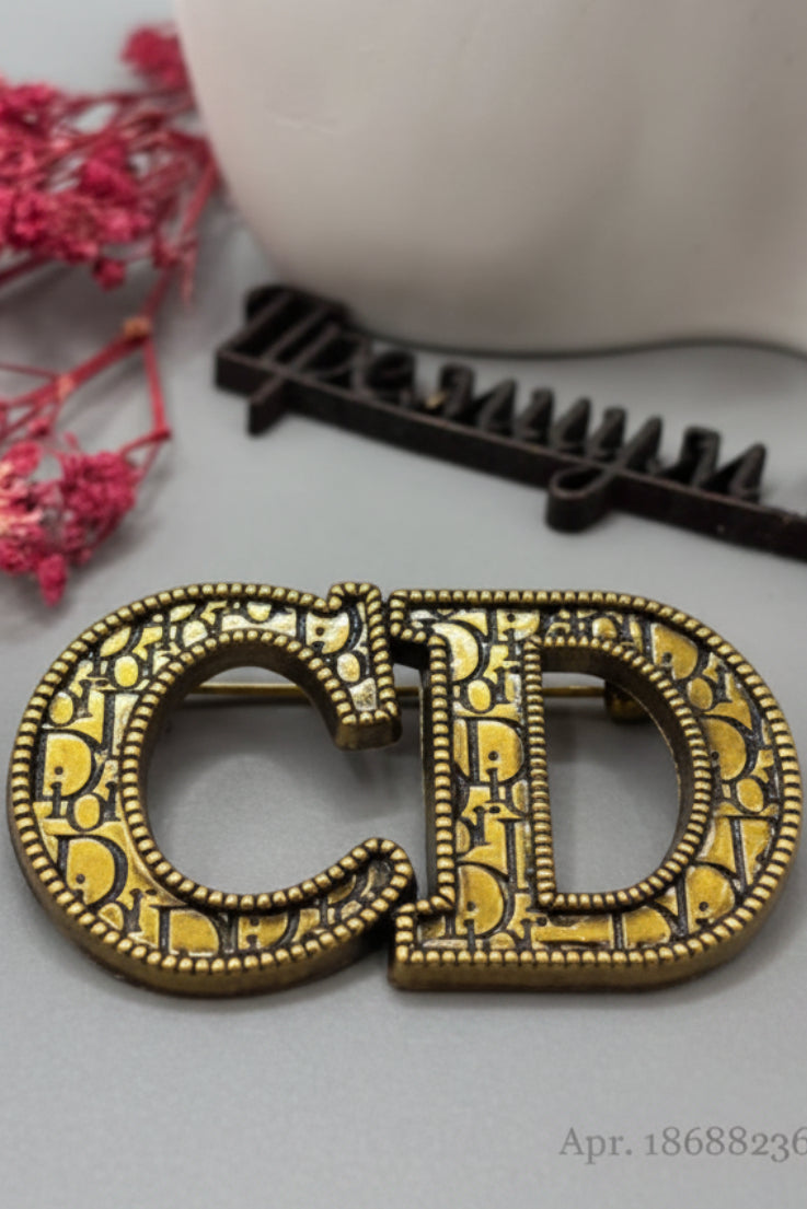 CD Brooch
