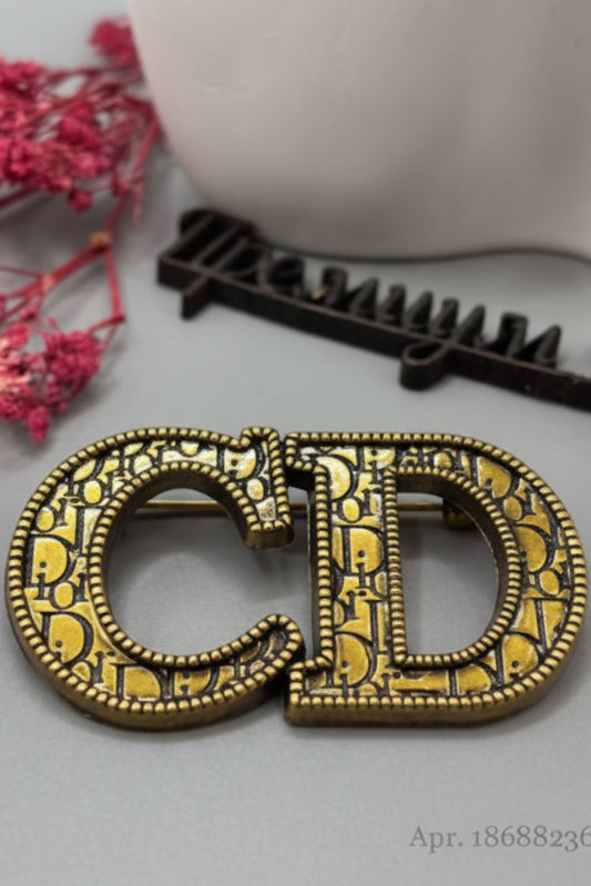 CD Brooch